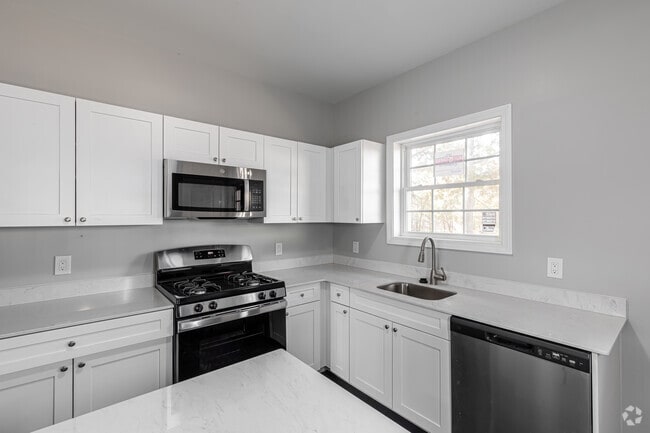 2BR, 2.5BA - Kitchen - Apex Townhomes