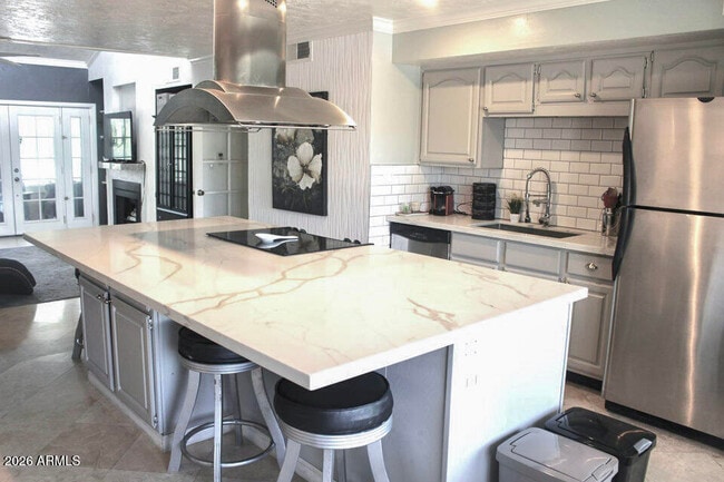 Building Photo - 5998 N 78th St Unit 211