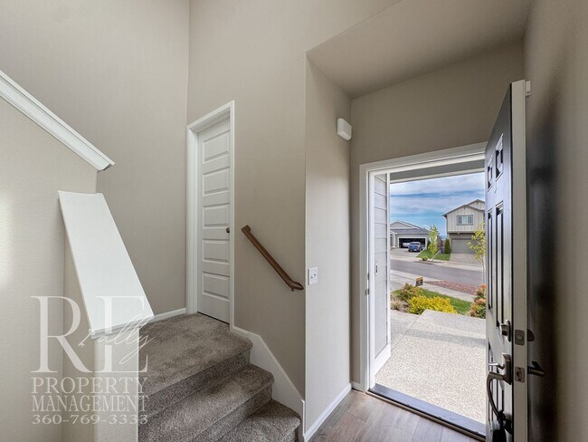 Photo - Warm & Inviting 4-Bedroom Home with Vaulted Ceilings, Loft, Fireplace & Fenced Backyard