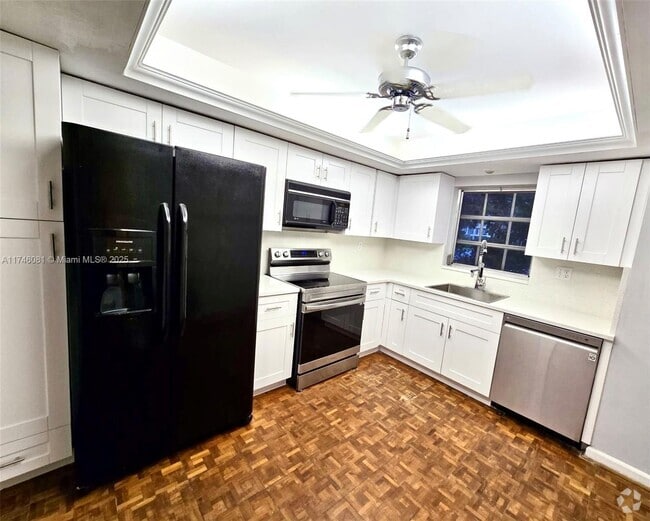 Building Photo - 3107 N Palm Aire Dr Unit 3107 Rental
