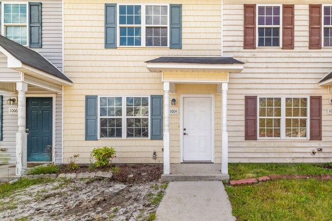 Photo - Charming 2-Bedroom 2.5-Bathroom Townhouse with Fenced Yard