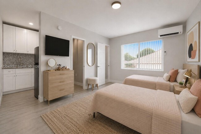 Building Photo - 6647 SW 59th Pl Unit 202