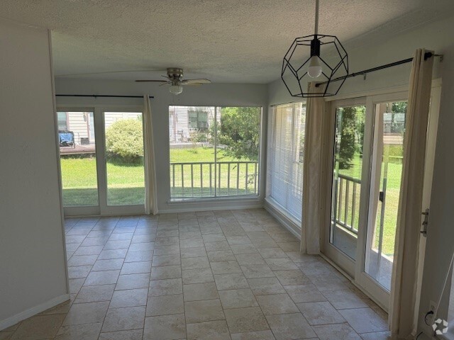 Building Photo - April Villas Triplex Unit A Rental
