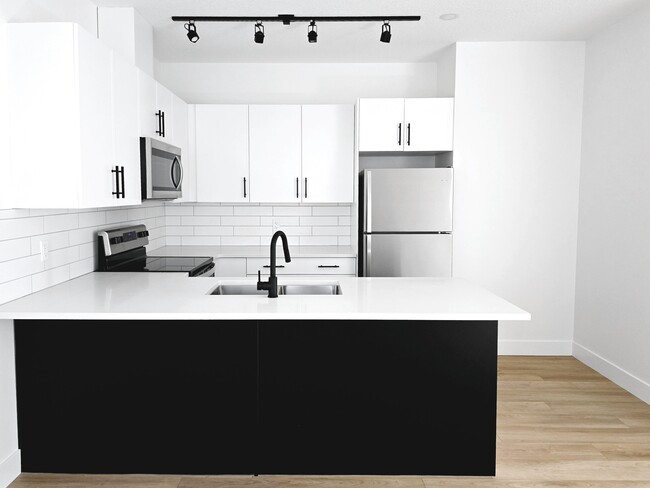 Building Photo - 9209-9117 117 Ave NW Unit 9209 MAIN
