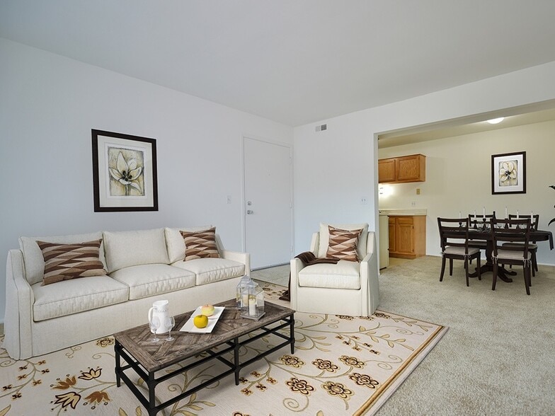 Spacious living room at Charter Oak Apartments, Davison, Michigan