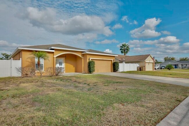 Photo - Spacious 4/2 Home with a Large Fenced Backyard and a 2 Car Garage Located in Buena Ventura Lakes ...