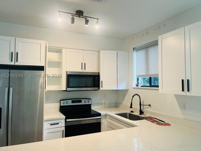 309 NW 7th St