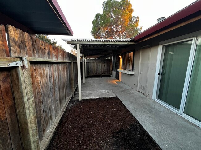 Patio leads out to carport parking