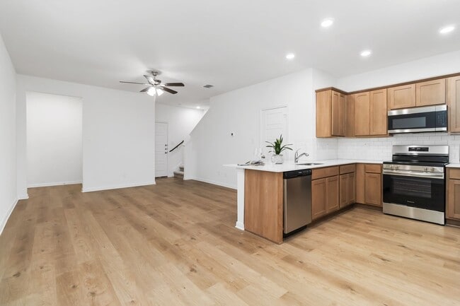 Photo - Brand-New 2-Story Townhome with Private Yard & 2-Car Garage