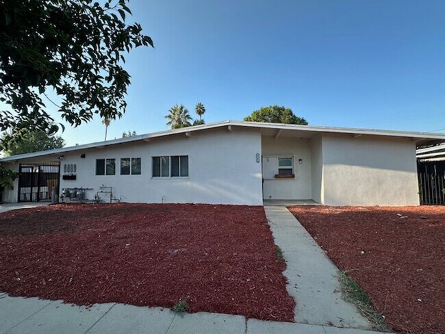Building Photo - Completely remodeled 4+2 sprawled across a... Rental