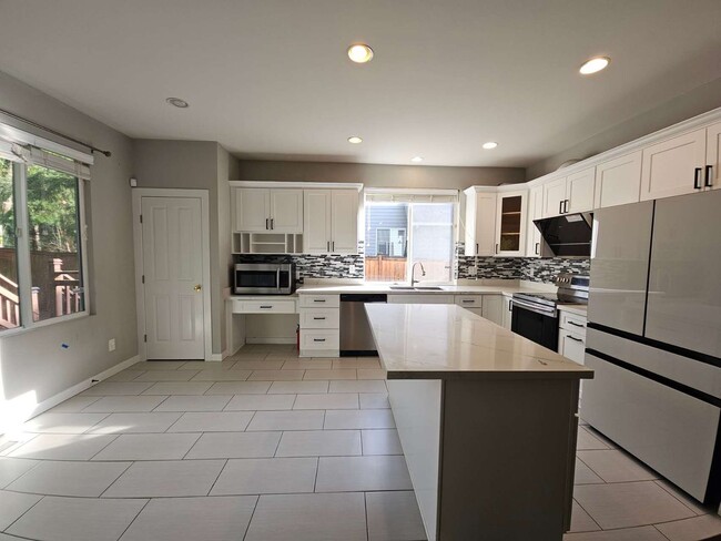 Photo - Beautiful 4BR Home in – Greenbelt View, 3-Car Garage, Fully Fenced Yard