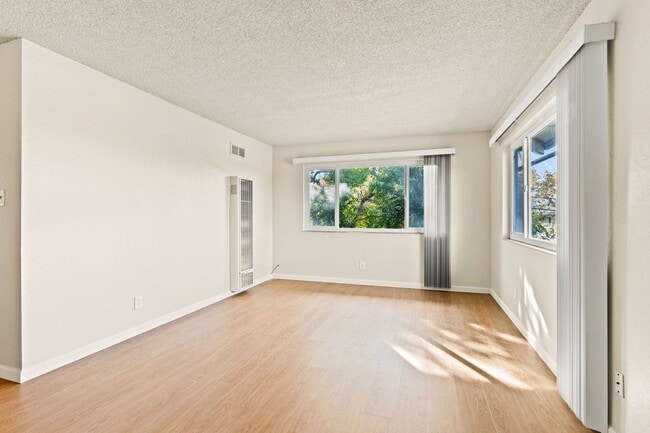Photo - Utilities Included! Hayward 2-Bedroom with On-Site Laundry, Parking & Brand New Floors Unit 3