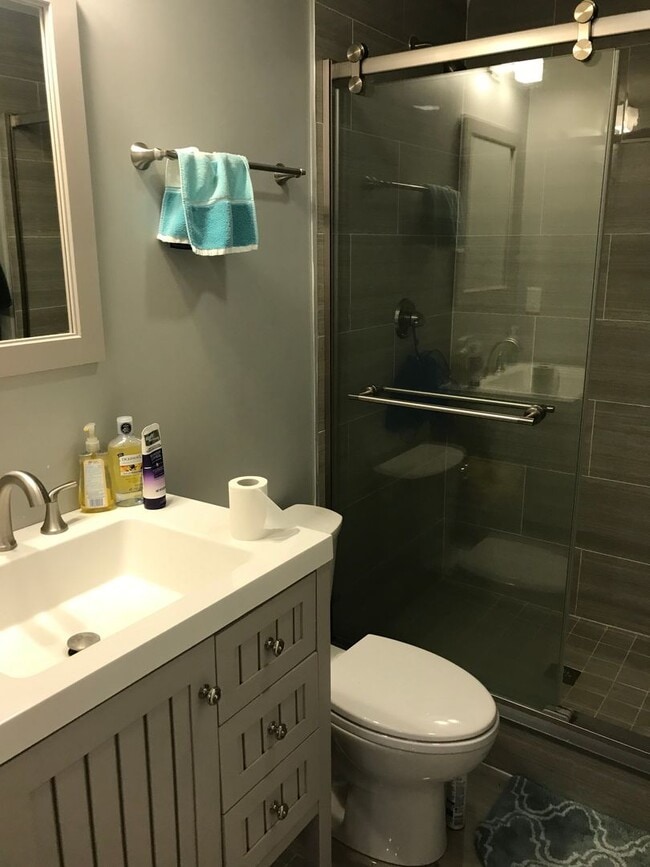 Photo - Spacious 4-Bed, 2-Bath Apartment Near Longwood & Northeastern — Ideal for Students!