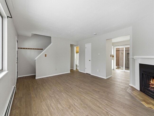 Photo - Spacious 2 Bed Condo W/ Bonus Basement Room, Fireplace & Garage Available NOW!