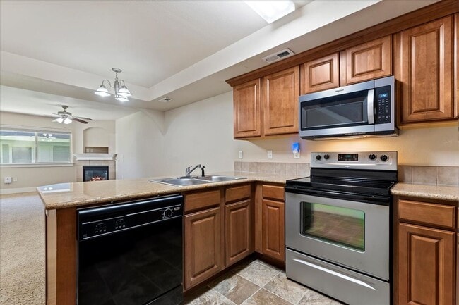 Building Photo - 9993 W Rosecroft Ct Unit 101
