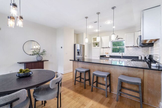 Photo - Available Now! Updated 2 Bedroom 2 1/2 Bathroom Condo! Parking Included! Unit #4