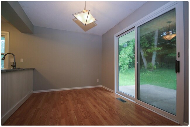 eat in dining area overlooking the back patio - 5662 Wood Duck Cir