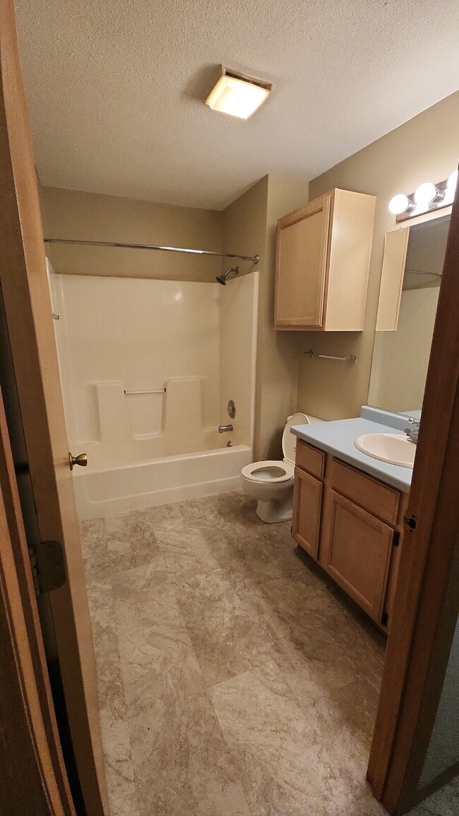 Photo - 2 Bedroom, 1 Bathroom with 2 Car Attached Garage - Available April 1st Unit 8