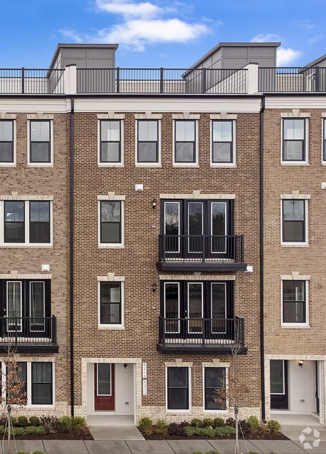 Building Photo - Brand-New Luxury 3BR Townhome-Style Condo ...
