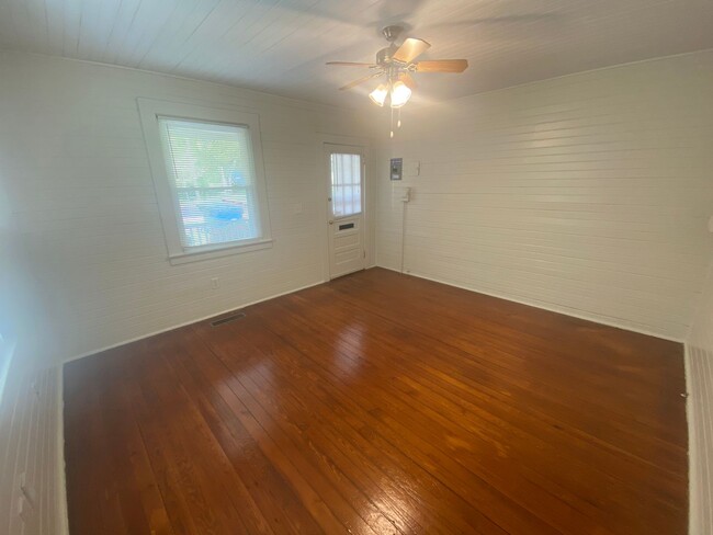 Photo - Walltown duplex with gleaming floors, a front porch, and a large pantry — all under $1,300. Unit B