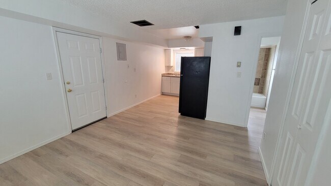 Kitchen from LIving room new LVP flooring - 6640 Provincial Dr Unit 6640