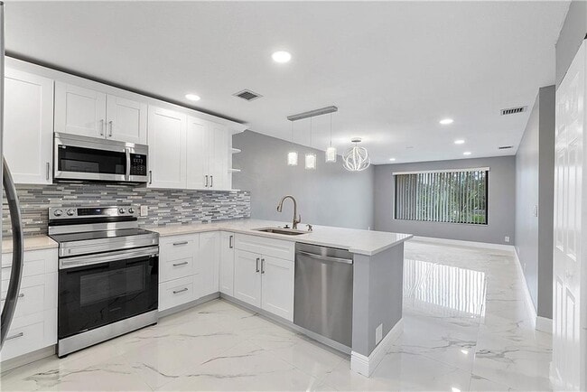 Photo - 11477 NW 39th Ct Unit 305-1