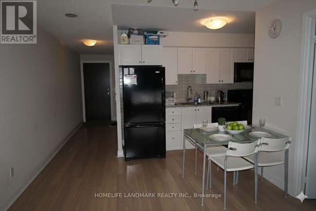 Photo - 135 Village Green Square Unit 1215