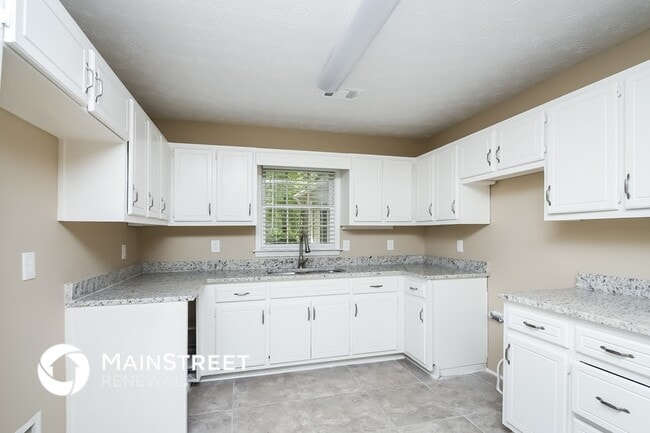 Photo - 606 Hamlet Ct SE