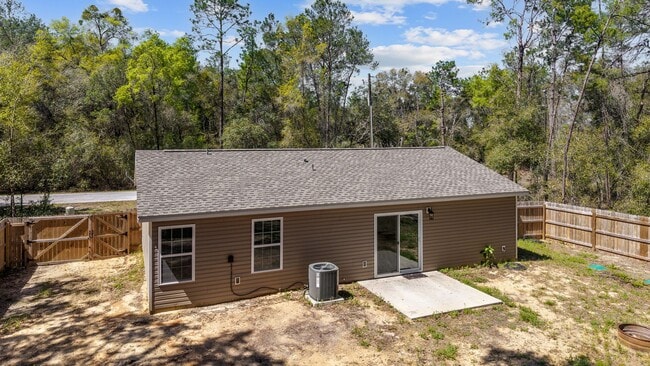 Photo - *** NOT READY FOR SHOW OR MOVE IN UNTIL AUGUST 1 *** Newer 3/2 in the country with fenced yard an...