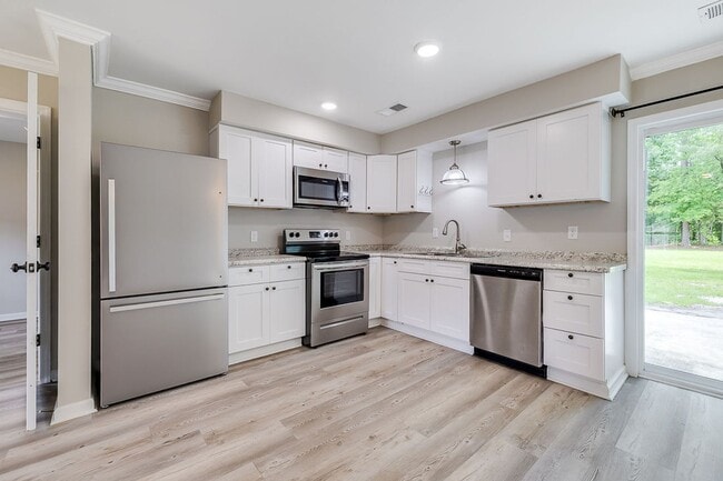 Photo - Freshly Painted 4 Bed Home on Huge Lot wit...