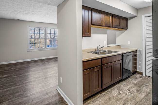 Kitchen View Into Living Room - Villas at Arboretum
