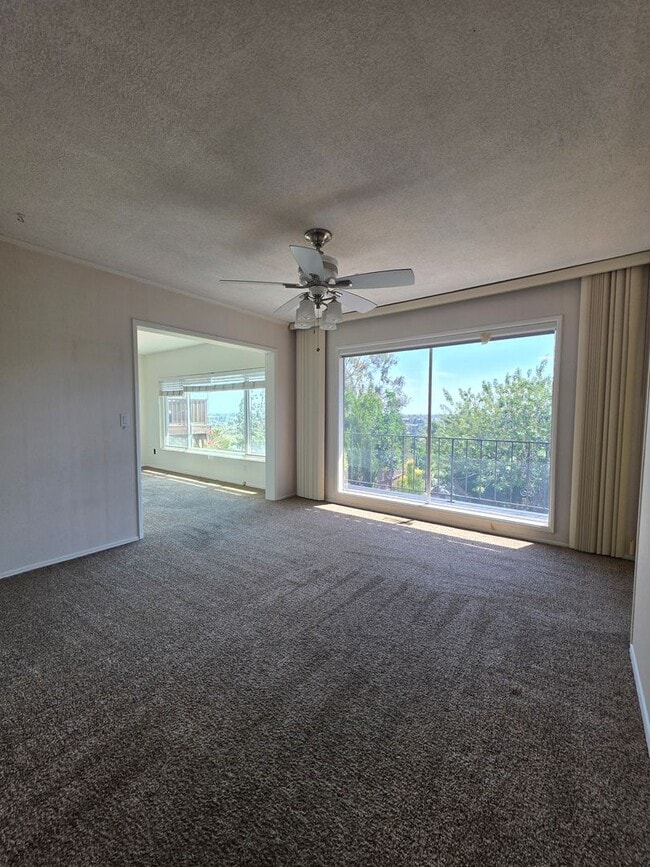 Photo - Stunning Del Cerro View Home with Spacious Split-Level Layout