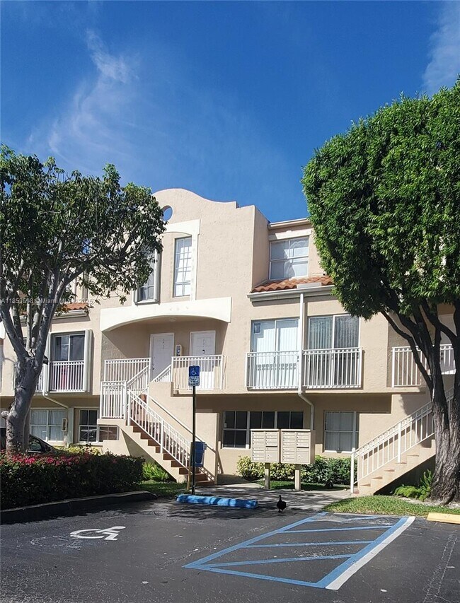 Building Photo - 8695 NW 6th Ln Unit 2-107 Rental