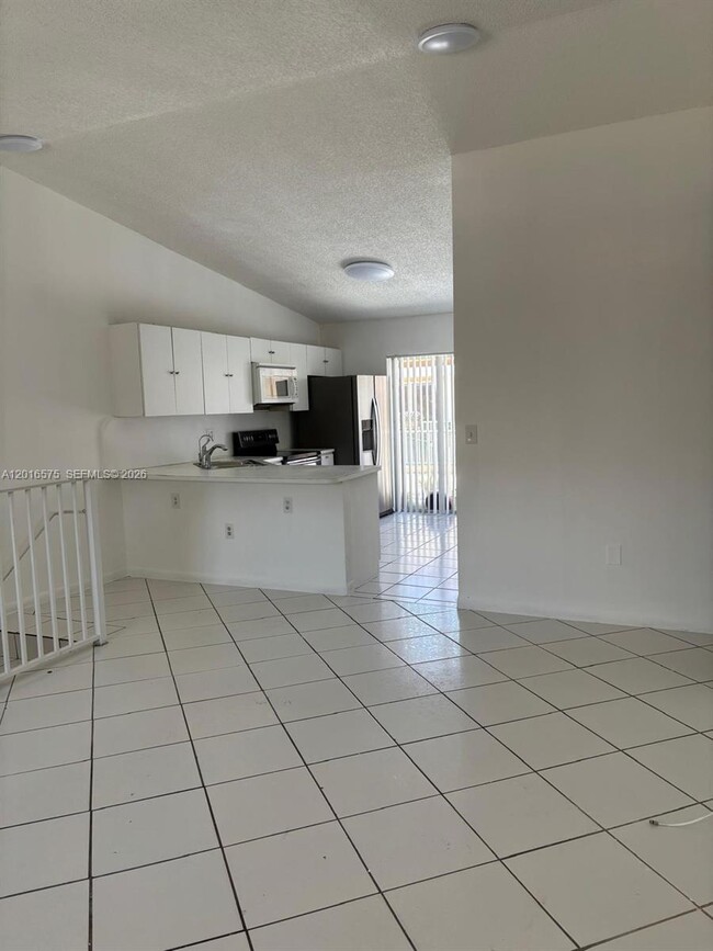 Building Photo - 7778 W 34th Ln Unit 20-201