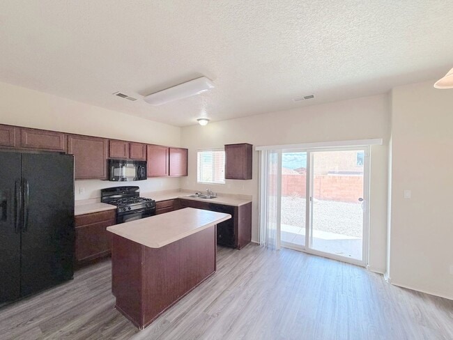 Photo - Beautiful 3 bed 2 bath in SW Albuquerque! Spacious layout. New Flooring! 2 Car Garage. Near 98th ...