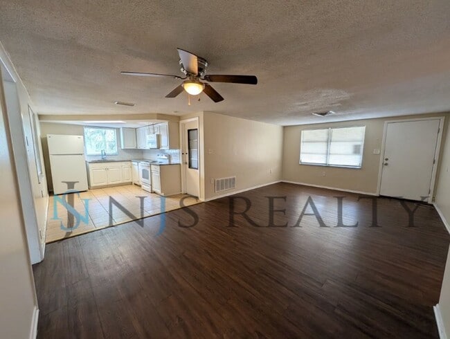 Photo - True 3 Bed~2 Bath~with garage. Over 1,000 sq ft, with updated kitchen & bathrooms, large open liv...
