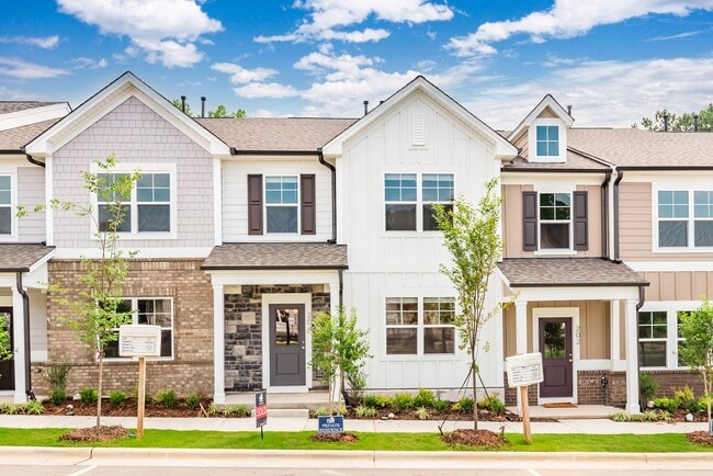 Building Photo - Like-New Townhome Walk to Downtown | Garage + Internet Included