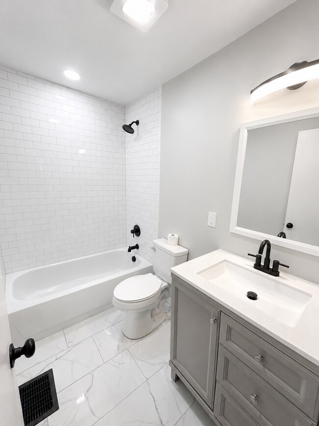 Photo - Newly Rehabbed 3-Bedroom Home with Modern Finishes & Fenced Backyard