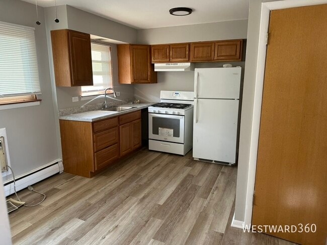 Building Photo - 13027 Seeley Ave Unit 5