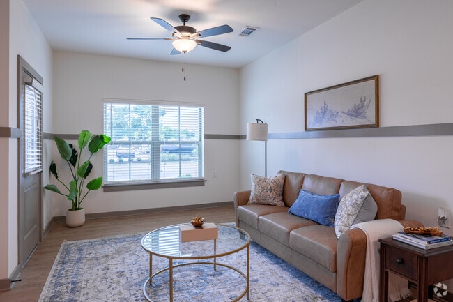2BR, 1BA - 928SF - Living Room - Capstone at the Oaks - 55+ Community