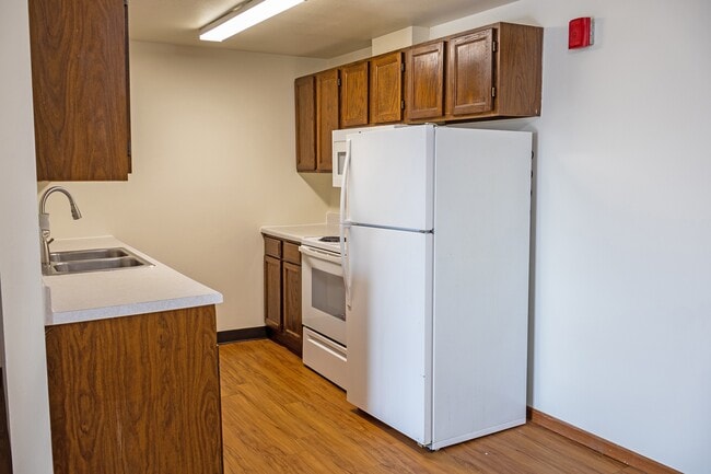 Step into modern living at The Gallery. This stylish kitchen features ample storage, sleek appliances, and a bright, open layout perfect for cooking and entertaining. Elevate your lifestyle today—schedule a tour!