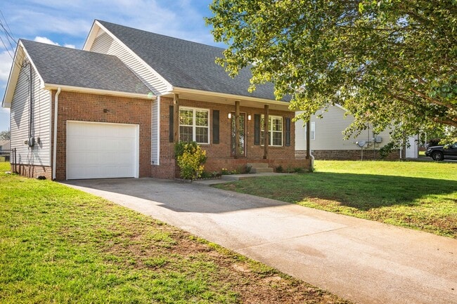 Photo - Charming Brick Home with Soaring Ceilings & Updated Finishes!
