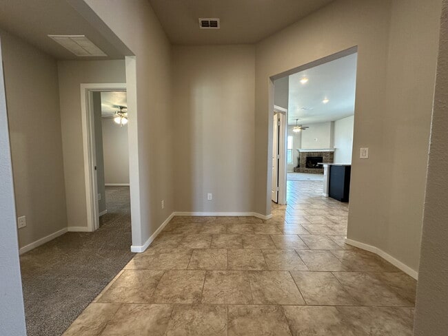 3-Bed Home with Cozy Fireplace in Bell Farms!