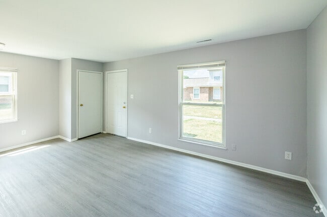 1BR, 1BA - 592SF - Living Room - River Pointe Townhomes