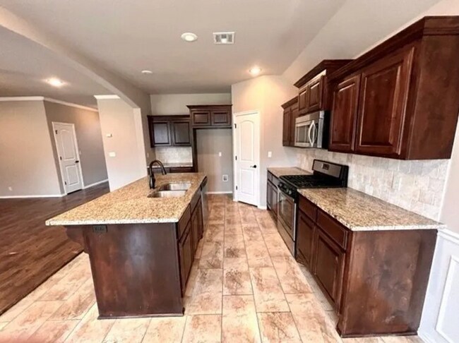 Photo - Discover this well-appointed 4-bedroom, 3-bath home in The Highlands at Forest Ridge, Broken Arrow.