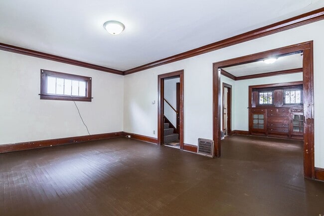 Photo - Charming 3BR Home with Classic Woodwork, Porch & Bonus Attic Space