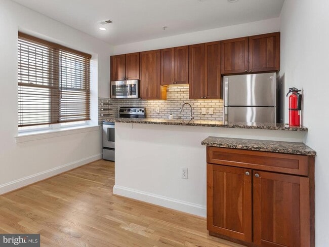 Building Photo - 1417 Chapin St NW Unit 207