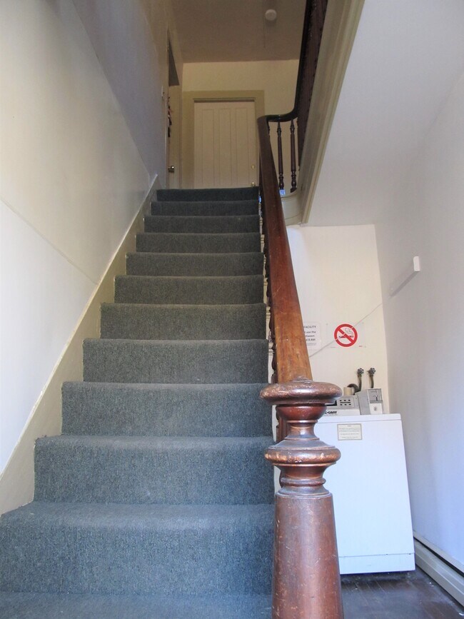 Apt 4 is upstairs and to the right