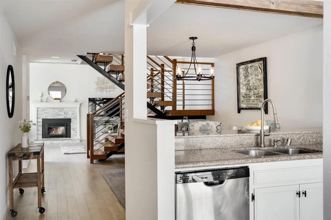 Photo - Spacious 1,550 Sq Ft Townhome | 2-Car Garage & High Ceilings w/ Exposed Beams