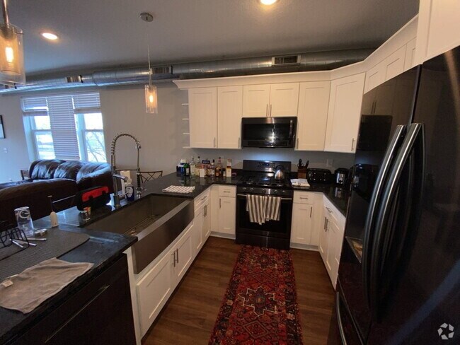 Building Photo - Stunning Sunsets on the Rooftop at this Be... Rental